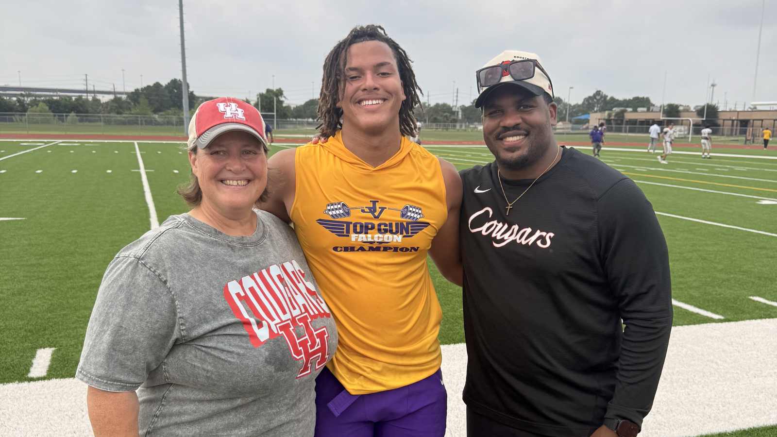 Cael's mom Elissa, pictured with Cael and Coach Ross