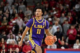 Jan 20, 2026; Gainesville, Florida, USA; Louisiana State Tigers guard Dedan Thomas Jr. (11) dribbles the ball against the Florida Gators during the first half at Exactech Arena at the Stephen C. O'Connell Center.