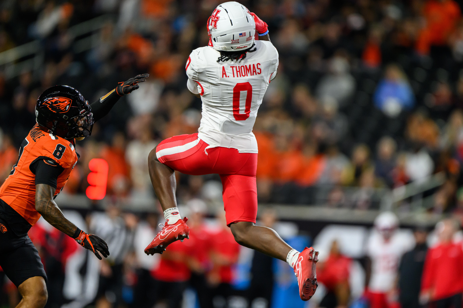 Sep 26, 2025; Corvallis, Oregon, USA; Houston Cougars wide receiver Amare Thomas (0) with a catch over the middle during the second quarter against the Oregon State Beavers at Reser Stadium.