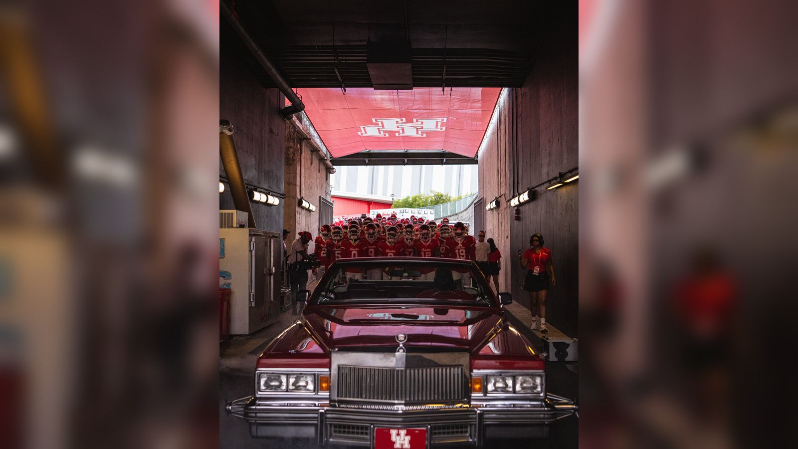 Houston Football Players enter behind signature Red Slab for Week 1