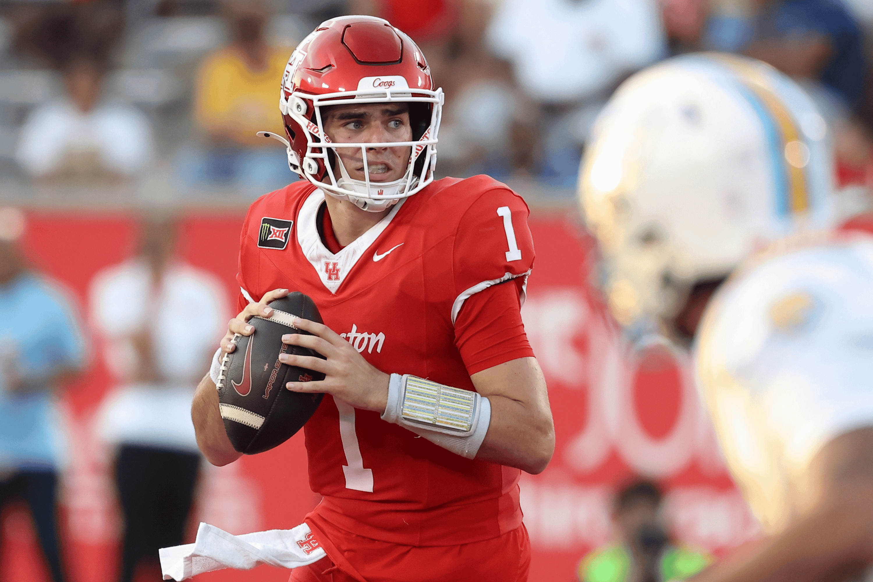Sep 12, 2026; Houston, Texas, USA; Houston Cougars quarterback Conner Weigman (1) looks for an open receiver during the second quarter against the Southern University Jaguars at TDECU Stadium.
