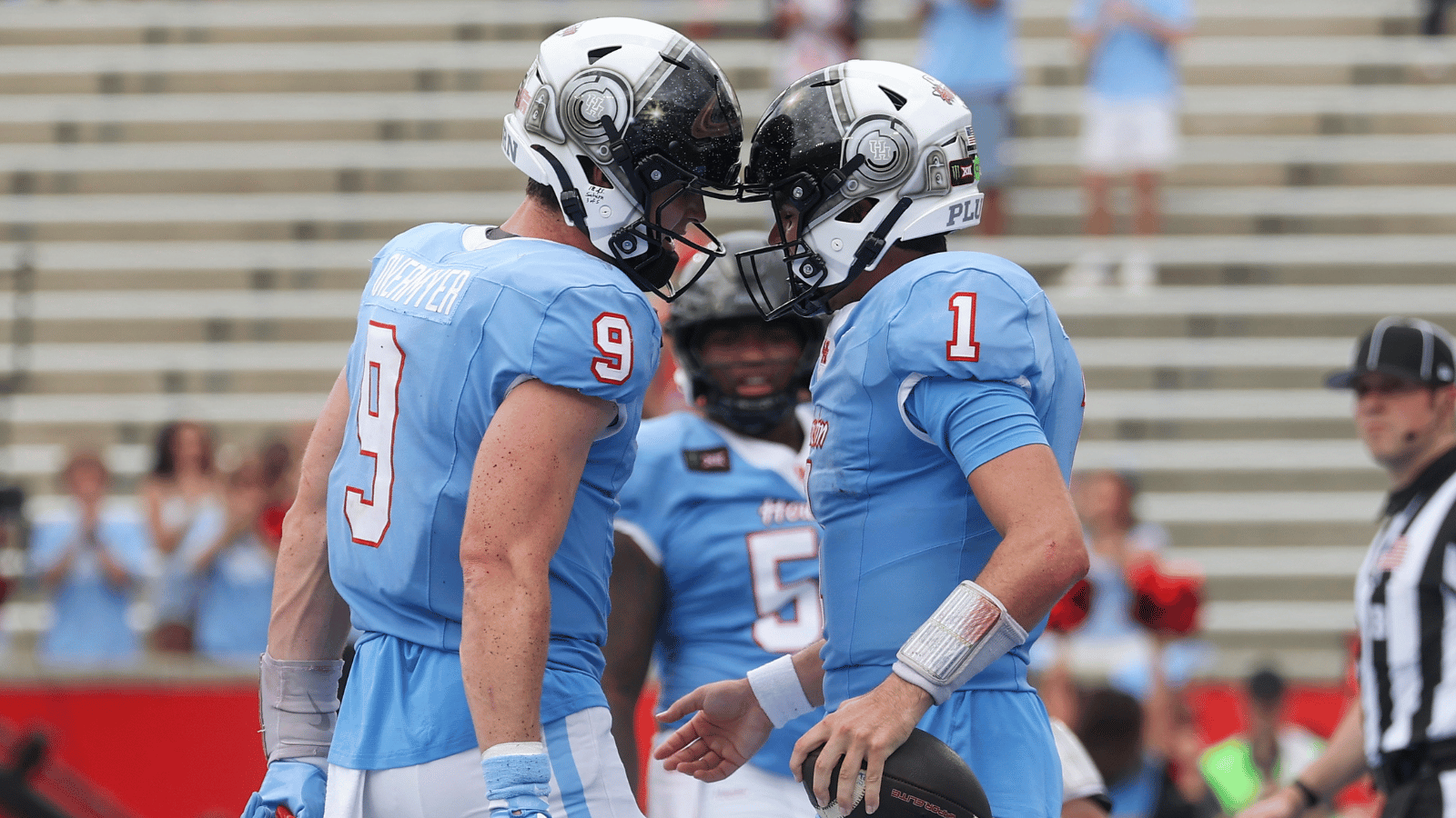 Oct 3, 2026; Houston, Texas, USA; Houston Cougars quarterback Conner Weigman (1) celebrates with tight end Patrick Overmyer (9) after scoring a touchdown during the third quarter against the UCF Knights at TDECU Stadium.