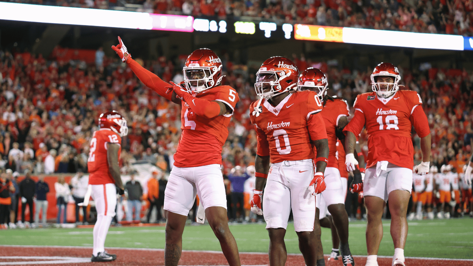 Oct 17, 2026; Houston, Texas, USA; Houston Cougars defensive back Will James (5) celebrates after a defensive play during the second quarter against the Oklahoma State Cowboys at TDECU Stadium.