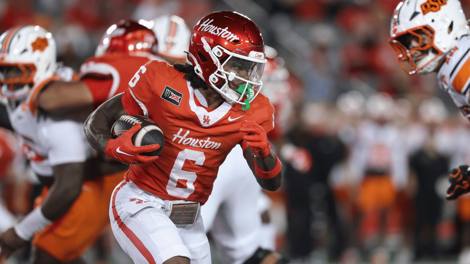 Oct 17, 2026; Houston, Texas, USA; Houston Cougars running back Re'shaun Sanford II (6) runs with the ball during the third quarter against the Oklahoma State Cowboys at TDECU Stadium.